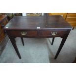 A George III oak two drawer side table