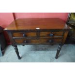 A George IV mahogany three drawer side table