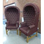 A pair of George III style upholstered hall porters chairs