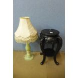 A Chinese ebonised jardiniere stand and an onyx table lamp