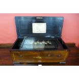 A 19th Century Swiss inlaid rosewood 12 air cylinder music box, with 23cms h x 67cms w