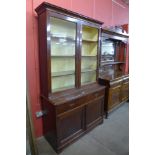 A Victorian mahogany bookcase (lacking one glass pane to door)