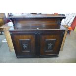 An early Victorian oak two door bookcase