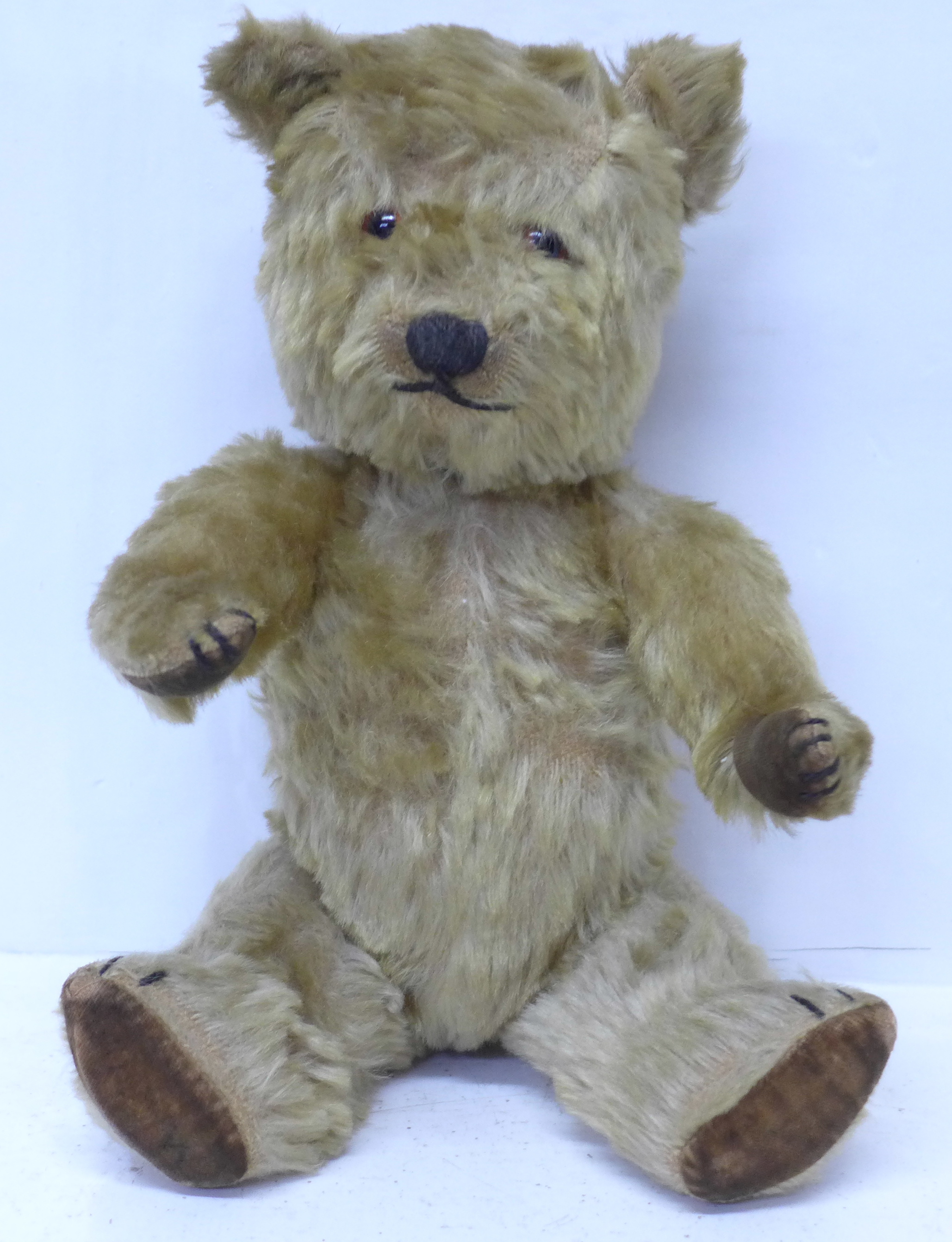 A jointed Teddy bear with plush body, 37cm