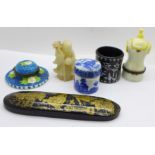 Two novelty trinket boxes, a carved figure, a lacquered spectacle case, a blue and white pot, and