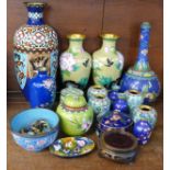 A collection of cloisonne ginger jars, vases and pots including four matching ginger jars (one