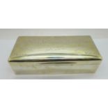 A silver cigarette box, with inscription, weight with liner 633g, width 20cm