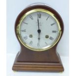 A Woodford floating balance clock with striking Franz Hermle movement, glass a/f