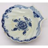 An 18th Century Lowestoft blue and white Peony pattern pickle dish of scallop form