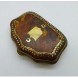 A tortoiseshell purse with yellow metal cartouche and pique work, a/f