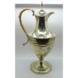 A George III silver claret jug, London 1816, makers mark worn, rattan handle a/f, 859g