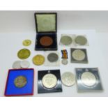 A collection of coins and medallions