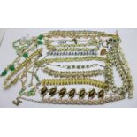 A collection of 1950's necklaces and bracelets