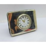 A small silver mounted desk clock, width 6.5cm