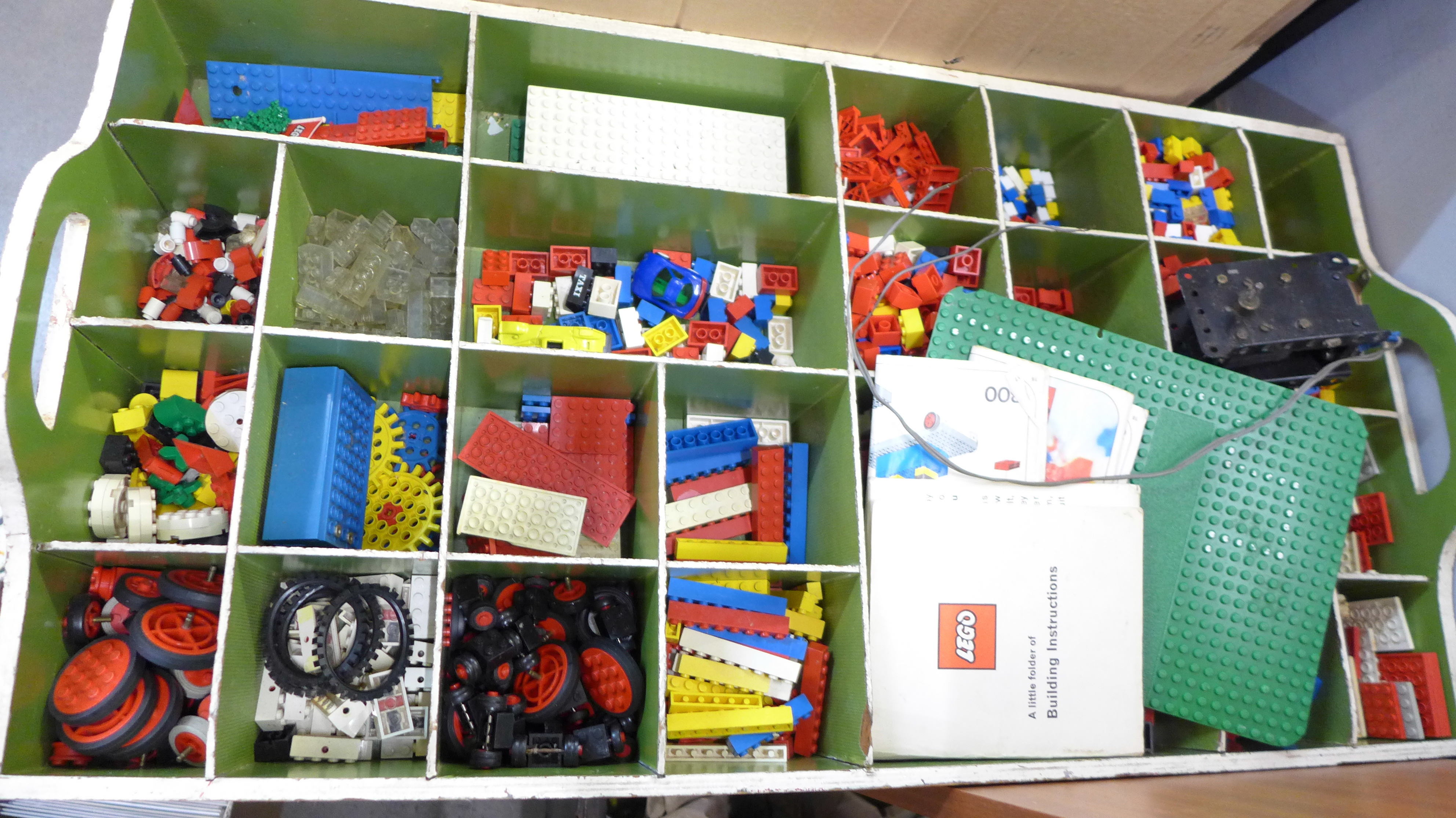 A crate of vintage Lego and a Meccano motor