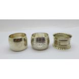Three silver napkin rings, Birmingham 1905, London 1902 and Chester 1924, total weight 74g