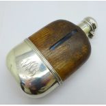 A leather covered glass hip flask, the sterling silver cup with monogram and date inscription, '