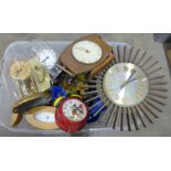 A collection of clocks including a Smiths quartz carriage clock, other carriage clocks, cuckoo,