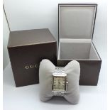 A Gucci wristwatch, with box, a/f, scratched