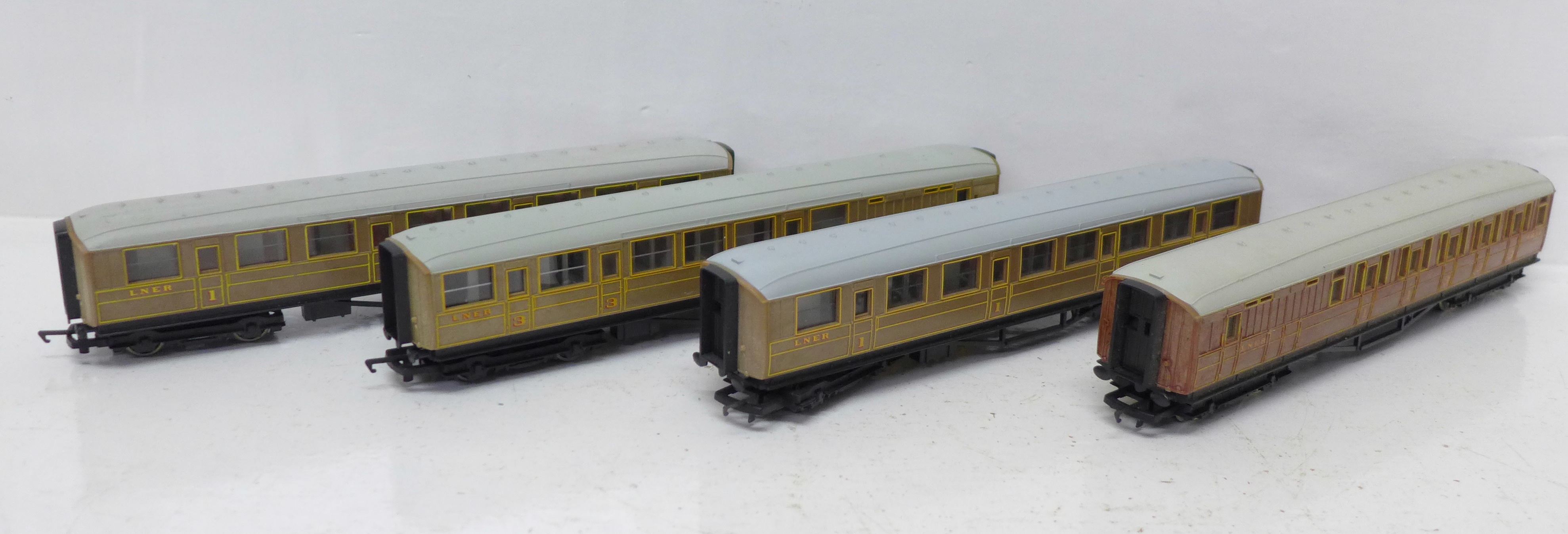 Four Hornby OO gauge railway coaches