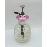 A sterling silver and enamel topped glass scent atomiser