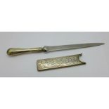 A silver handled letter opener and a silver comb case, Birmingham 1921