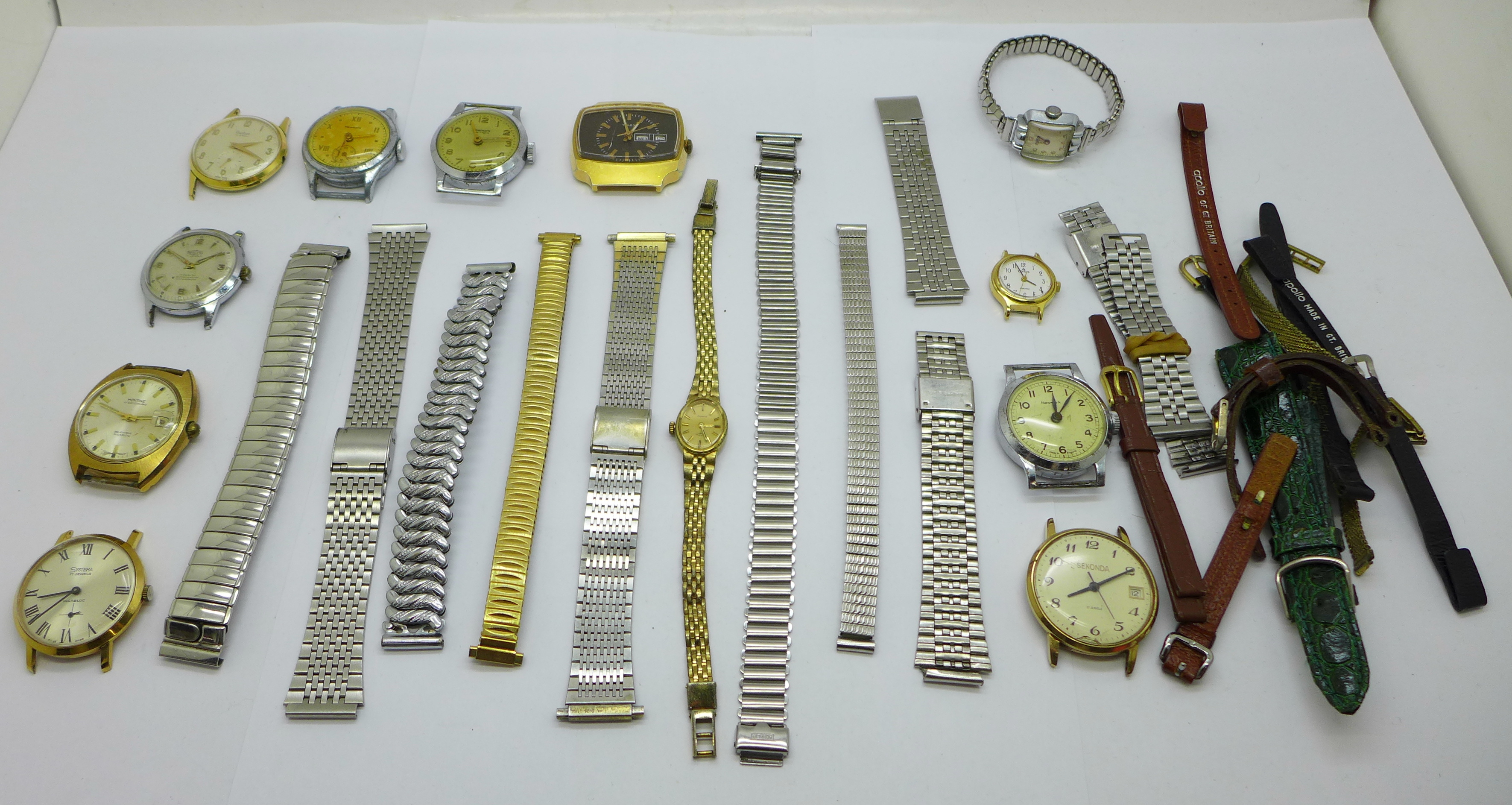 Wristwatch heads and bracelet straps