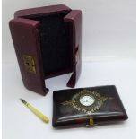 A tortoiseshell pique aide memoire case set with a small timepiece, a/f