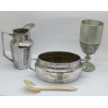 A plated Arts and Crafts cream jug and sugar, a mother of pearl spoon and a Tumasek pewter goblet