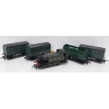 Four Hornby OO gauge railway carriages, one a/f and a Hornby GWR tank engine