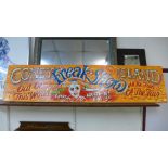 A painted Coney Island Freak Show sign