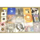 A collection of 45rpm 7" vinyl singles, Jimi Hendrix, Deep Purple etc., and a collection of LP