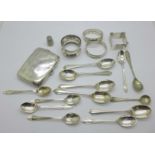 A silver cigarette case, four silver napkin rings, eleven silver spoons, two plated spoons and a