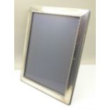 A silver photograph frame, Carrs Sheffield, 18cm x 23cm