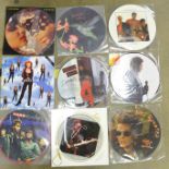 Fifteen 12" picture disc records, including Prince, Spandau Ballet, Talking Heads