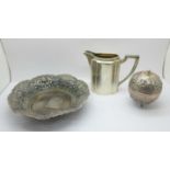 A German 800 silver jug, a pierced dish marked 800 and a white metal lidded pot, total weight 450g