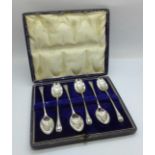 A cased set of six silver coffee spoons, Sheffield 1910, Robert Pringle & Sons, 57g