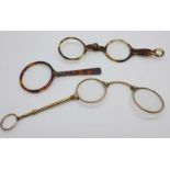 Two pairs of lorgnettes including one gold plated and a folding eyeglass