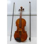 A Chinese student's violin with two bows