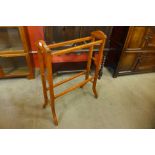 An Edward VII mahogany towel rail