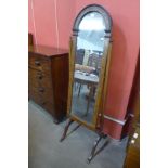 An Edward VII inlaid walnut cheval mirror