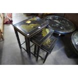 A Chinese black lacquered chinoiserie nest of tables