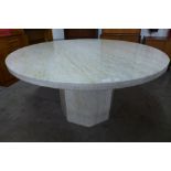 An Italian style marble circular dining/centre table