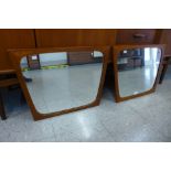 A pair of Danish teak framed mirrors