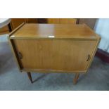 A teak record cabinet