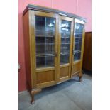 A carved mahogany bookcase