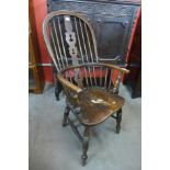 A 19th Century elm and beech highback Windsor armchair