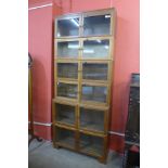 A mid 20th Century oak six tier bookcase