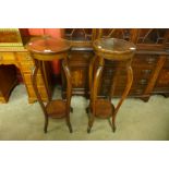 A pair of Edward VII walnut jardiniere stands