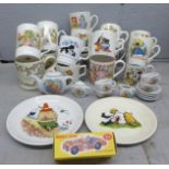 An assortment of childrens mugs, plates, a toy tea set and a Boncath pottery Queen Elizabeth 80th